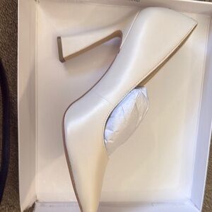 Ivory pumps / heels by Nine West - women’s size 8.5